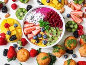 A Bowlful Of Fruits In Different Colors