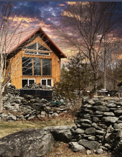 A Beautiful House Surrounded With Stones