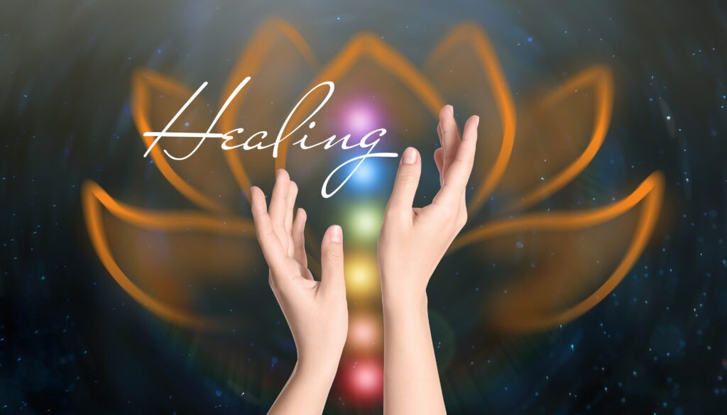 Hands reaching towards healing energy lotus.