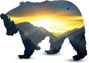 Bear silhouette with mountain landscape inside.